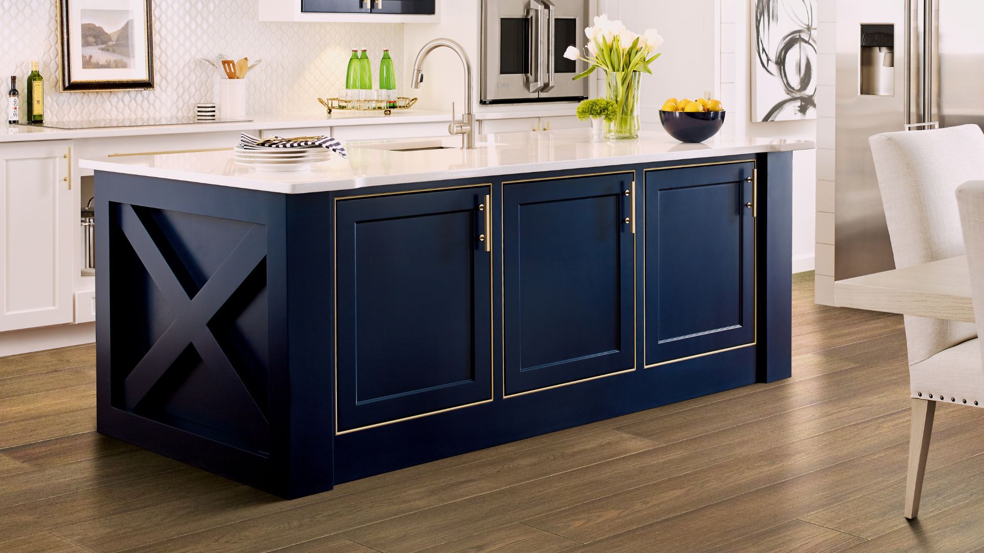 hardwood flooring in an elegant kitchen with large island 